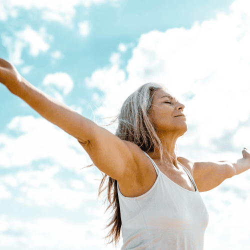 a woman with her arms outstretched