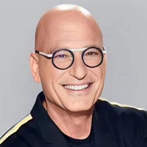 A bald man named Matt Fraser, wearing round glasses and a black shirt, smiles at the camera against a plain gray background.